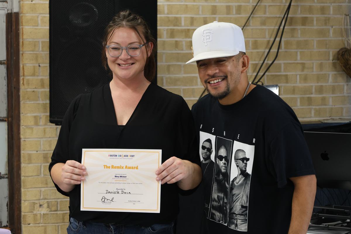 Danielle Duca receiving The Remix Award from Bboy Wicket