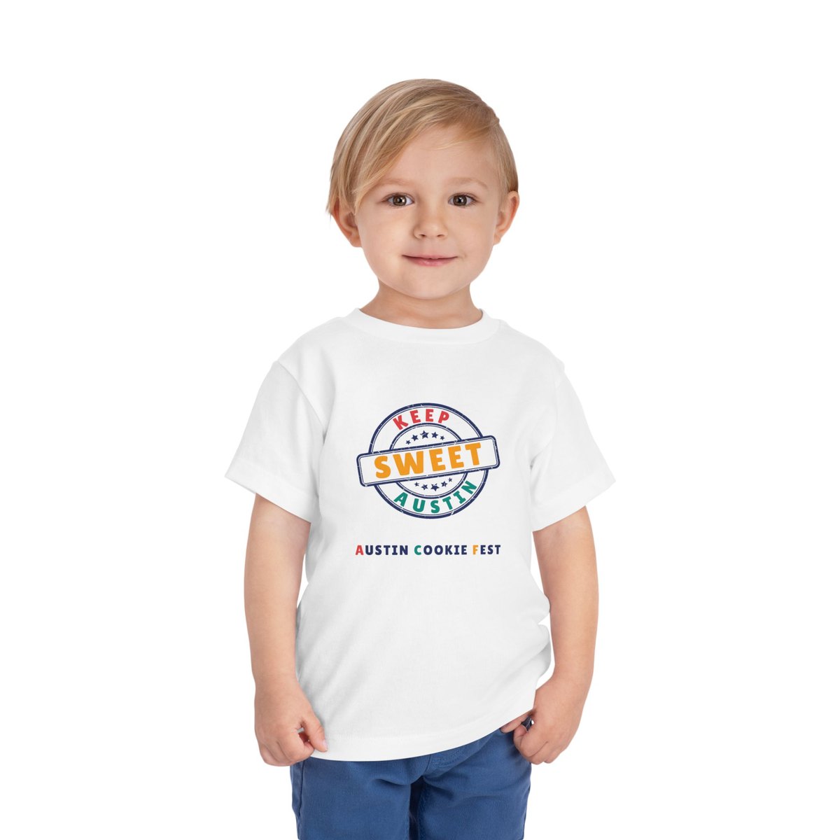 A toddler in the Keep Austin Sweet tee